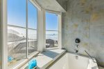 Primary bathroom at Whaletopia with ocean views from the tub